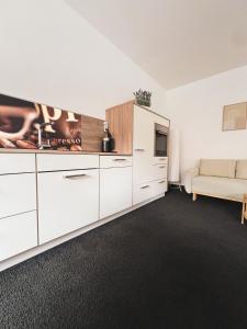 Kuchyň nebo kuchyňský kout v ubytování Limok Apartments + 3 fotografie