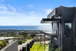 a house with a view of the ocean at OMG the Views! Your Luxury Bay Retreat Awaits! in McCrae
