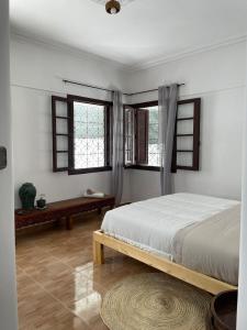 Postelja oz. postelje v sobi nastanitve Syrah Home