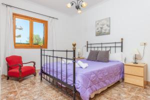 Łóżko lub łóżka w pokoju w obiekcie Villa Fernando