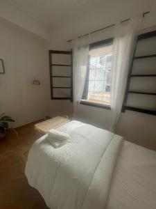 Postelja oz. postelje v sobi nastanitve Syrah Home