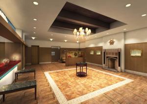 een grote lobby met een open haard en een open haard bij Hotel Monte Hermana Kobe Amalie in Kobe