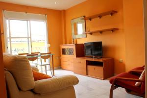 Un televizor și/sau centru de divertisment la Apartamento Luminoso Y Acogedor