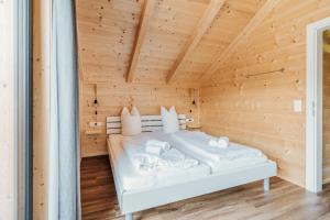 Postel nebo postele na pokoji v ubytování Clofers Relax Residences Rattendorf