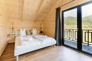 Postel nebo postele na pokoji v ubytování Clofers Relax Residences Rattendorf