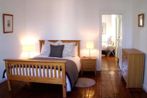 Ένα ή περισσότερα κρεβάτια σε δωμάτιο στο Maison 225