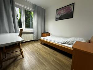 Postel nebo postele na pokoji v ubytování Pension Hostel Herdorf