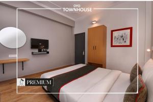 Postel nebo postele na pokoji v ubytování Townhouse Singapore Mall