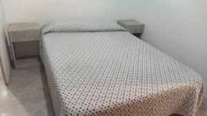 Ένα ή περισσότερα κρεβάτια σε δωμάτιο στο Dpto 1