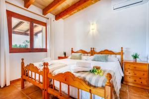 Postel nebo postele na pokoji v ubytování Chalet Turó by dracmallorca + 37 fotografií
