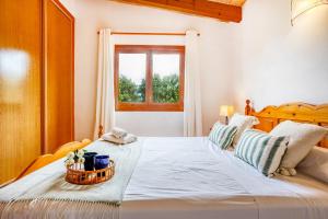 Postel nebo postele na pokoji v ubytování Chalet Turó by dracmallorca