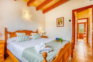 Postel nebo postele na pokoji v ubytování Chalet Turó by dracmallorca