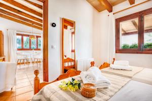 Postel nebo postele na pokoji v ubytování Chalet Turó by dracmallorca