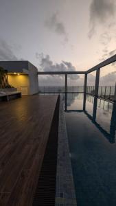 a swimming pool on top of a building at 8B Flemington Colombo in Colombo