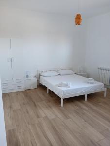 Postel nebo postele na pokoji v ubytování I due Fratelli