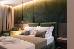 Letto o letti in una camera di Cuni Luxury Hotel