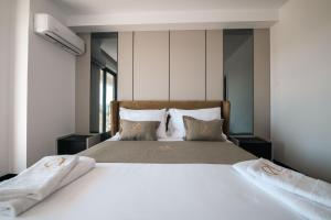 Letto o letti in una camera di Cuni Luxury Hotel