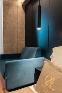 Letto o letti in una camera di Cuni Luxury Hotel