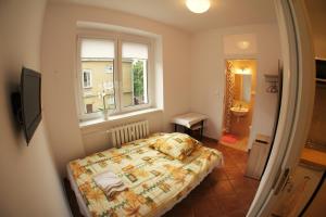Posteľ alebo postele v izbe v ubytovaní Apartament Poznań Jeżyce