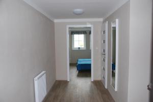 Posteľ alebo postele v izbe v ubytovaní Apartment Ptačí Dům