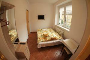 Posteľ alebo postele v izbe v ubytovaní Apartament Poznań Jeżyce