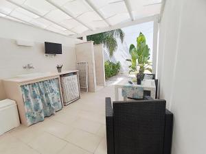 Η κουζίνα ή μικρή κουζίνα στο Casa Vacanze Schiuma di Mare