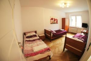 Posteľ alebo postele v izbe v ubytovaní Apartament Poznań Jeżyce