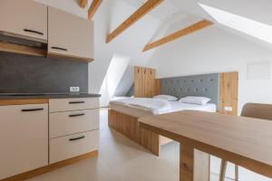 Postel nebo postele na pokoji v ubytování Apartments Viktor