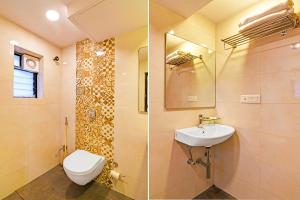 a bathroom with a toilet and a sink and a mirror at FabHotel Kzar Select - Nr US Consulate in Kolkata