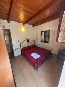 Postel nebo postele na pokoji v ubytování B&B Da Fiorò