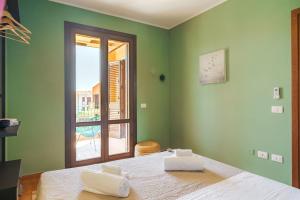Postel nebo postele na pokoji v ubytování Casa Vacanze Zenith + 22 fotografií