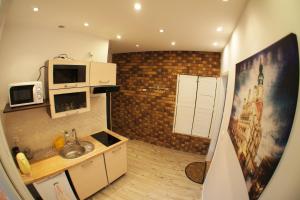 Kuchyňa alebo kuchynka v ubytovaní Apartament Poznań Jeżyce