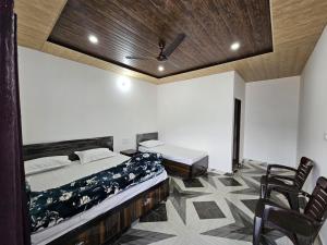 TMS Resort客房内的一张或多张床位