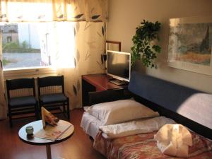 Postel nebo postele na pokoji v ubytování Hotel Kemijärvi