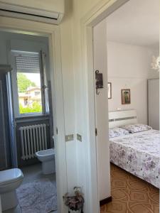 Postel nebo postele na pokoji v ubytování Elly Casa Vacanze
