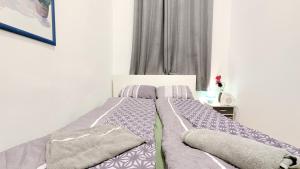 Postel nebo postele na pokoji v ubytování Comfortable rooms in Lugner City area HE