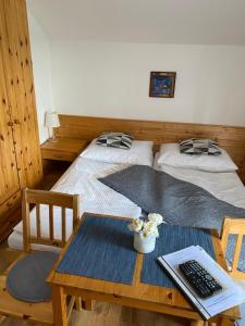 Postel nebo postele na pokoji v ubytování Alba Apartmany Železná Ruda