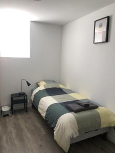 Gîte de l'hôtel Castel客房内的一张或多张床位