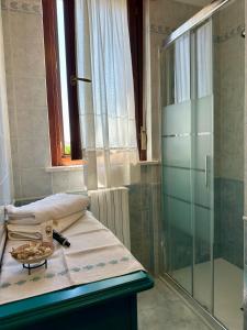 Koupelna v ubytování B&B SGUARDO AL CONERO