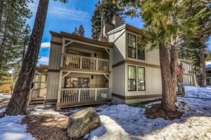 a large house with trees in the snow at Boho Hideaway in Kings Beach