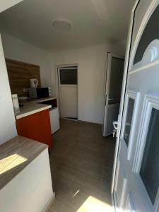 a room with a kitchen with a counter top at Casa Hax Mangalia in Mangalia