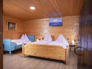 Posteľ alebo postele v izbe v ubytovaní Holiday Home Hochzillertalblick by Interhome