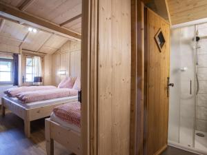 Posteľ alebo postele v izbe v ubytovaní Holiday Home Hochzillertalblick by Interhome