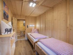 Posteľ alebo postele v izbe v ubytovaní Holiday Home Hochzillertalblick by Interhome