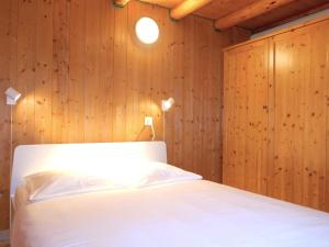 Postel nebo postele na pokoji v ubytování Holiday Home Rustico dell'Orino by Interhome