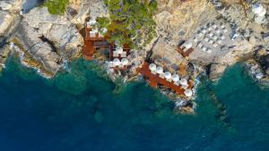 an aerial view of a house on a cliff at Lov Faralya Adults Only in Faralya