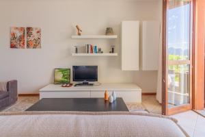 Et tv og/eller underholdning på Giardino al Tramonto