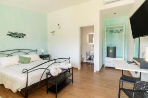 Posteľ alebo postele v izbe v ubytovaní Agriturismo Sa Jana Holidays - Adults Only