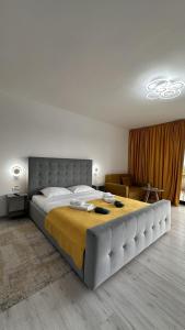 Postel nebo postele na pokoji v ubytování Green Heaven Resort Gorj