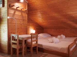 Krevet ili kreveti u jedinici u okviru objekta Chalet Lò Batcho by Interhome